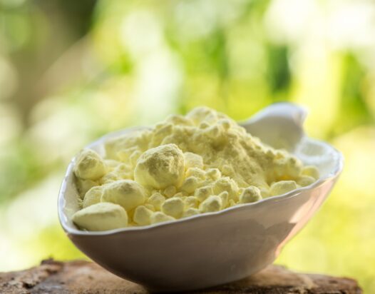 Kén (Sulphur) vagy kénpor, természetes háttér.