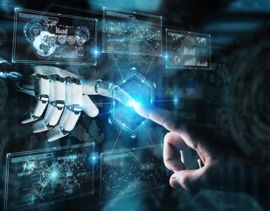 Robotkéz és emberi kéz egymáshoz ér