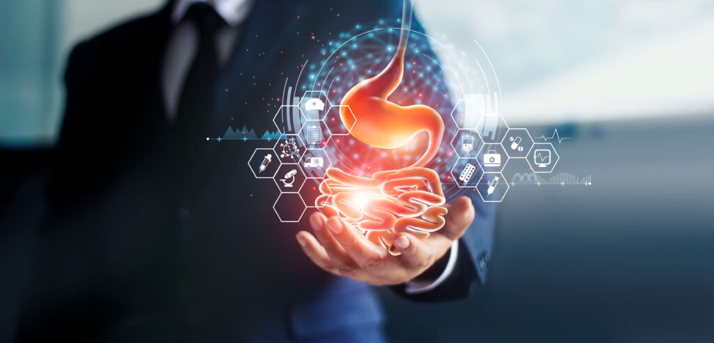 Üzletember, aki a hasát fogja a kezével, és gyomorfájdalma van gyomorhurut vagy GERD (gastrooesophagealis reflux betegség) miatt. Az emésztési zavar szívtáji égetést vagy savas emésztési problémákat okoz. Orvosi és egészségbiztosítás.