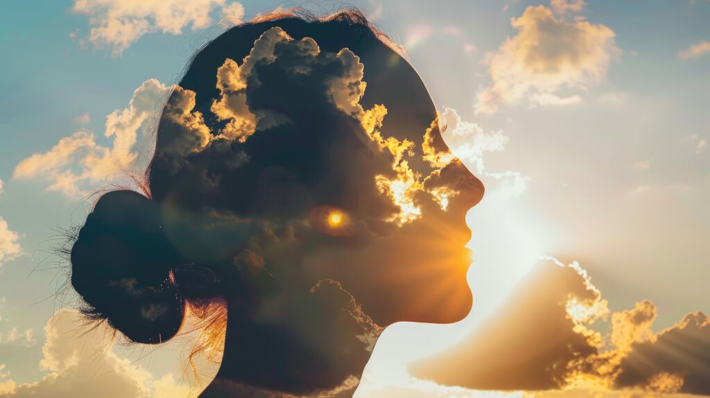 Öngyógyítás, gyógyító gondolatok, meditáció. Egy nő fejében felhők és fény illusztráció látható.